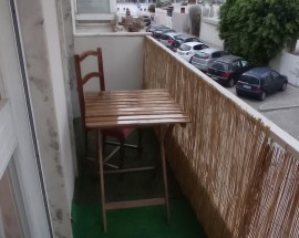 Arrendo quarto na baixa de Faro com sacada e terraco